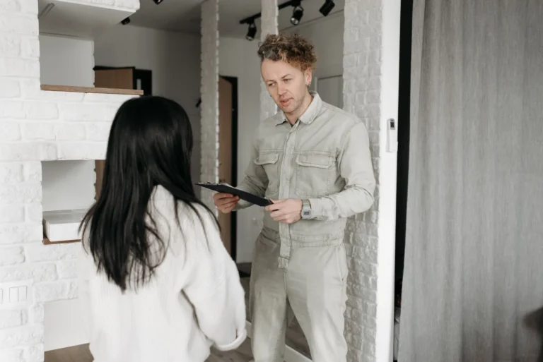Homeowner talking with a worker