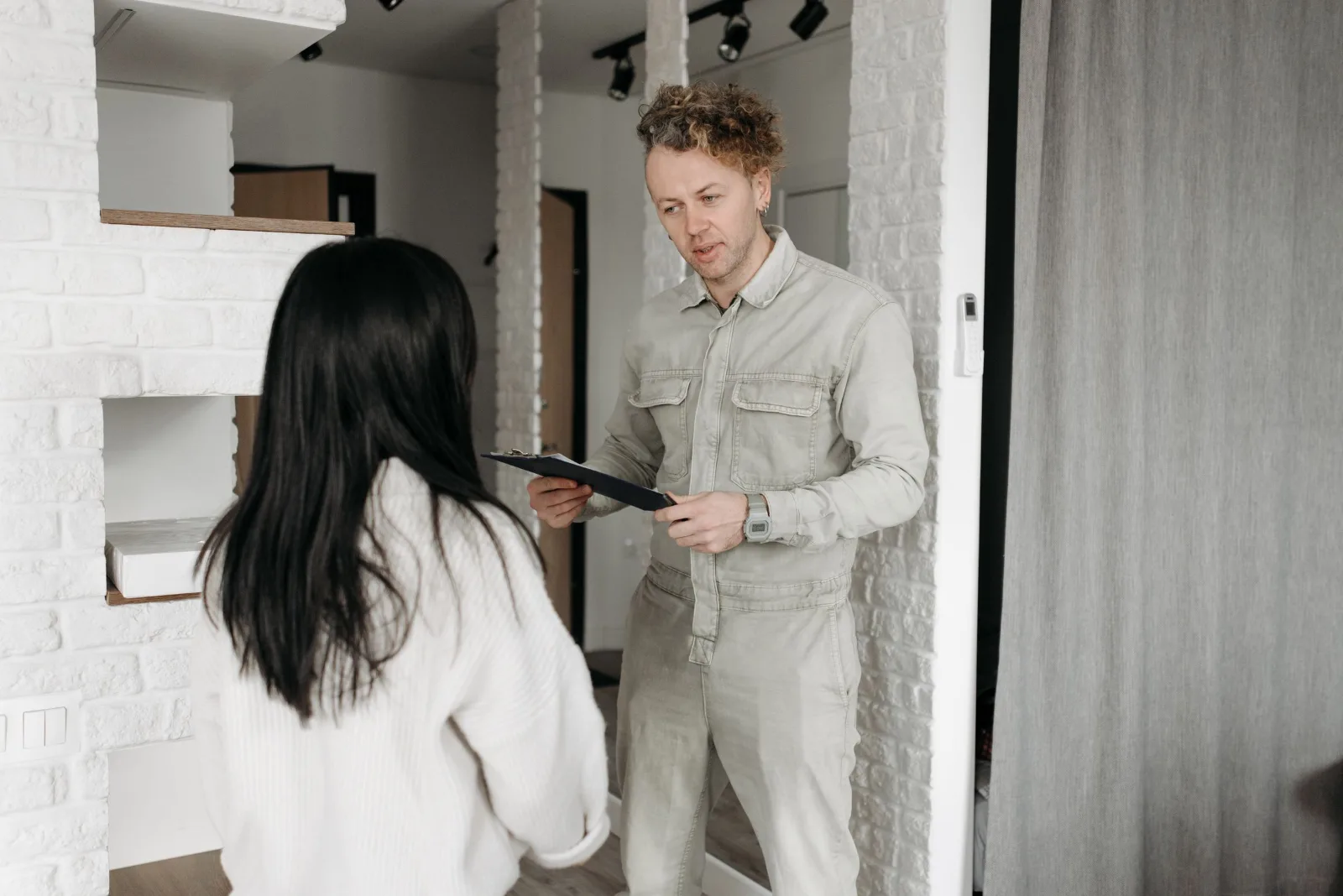 Homeowner talking with a worker